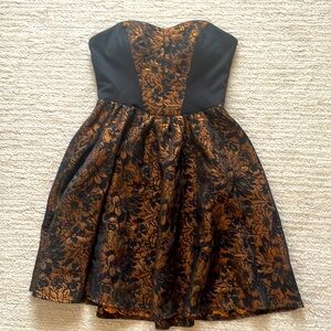 Betsey Johnson black and copper dress size 2. Good condition.